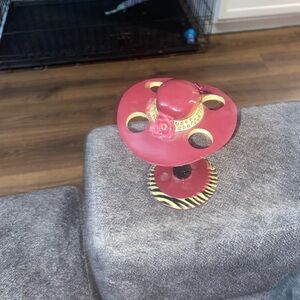 Elegant Red and Gold Hat-Shaped Home Accent